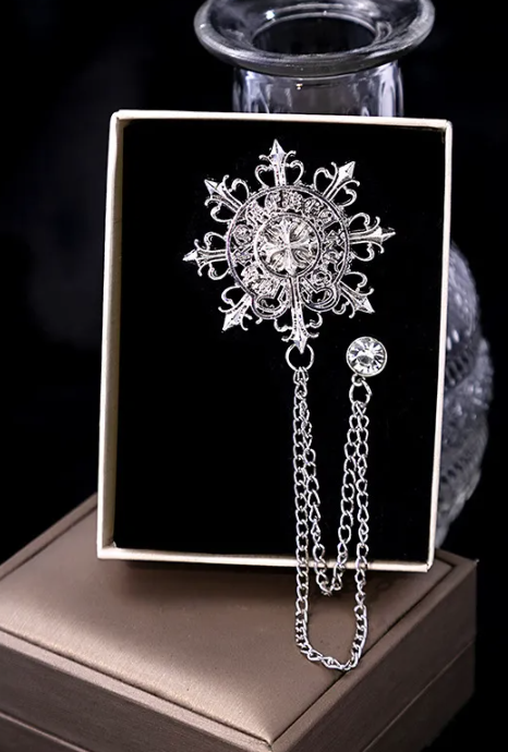 Elegant Silver Sunburst Chain Brooch Unisex