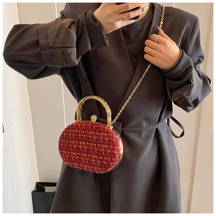 The Rouge Royale Oval Clutch – Red & Gold Plaid
