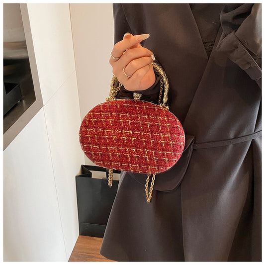 The Rouge Royale Oval Clutch – Red & Gold Plaid