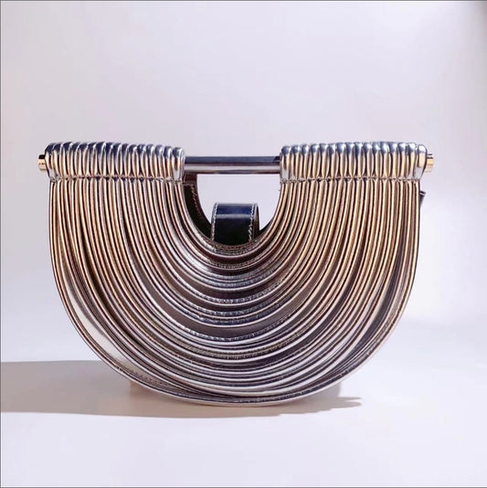 Sculptural Metallic Clutch | Stylescentry