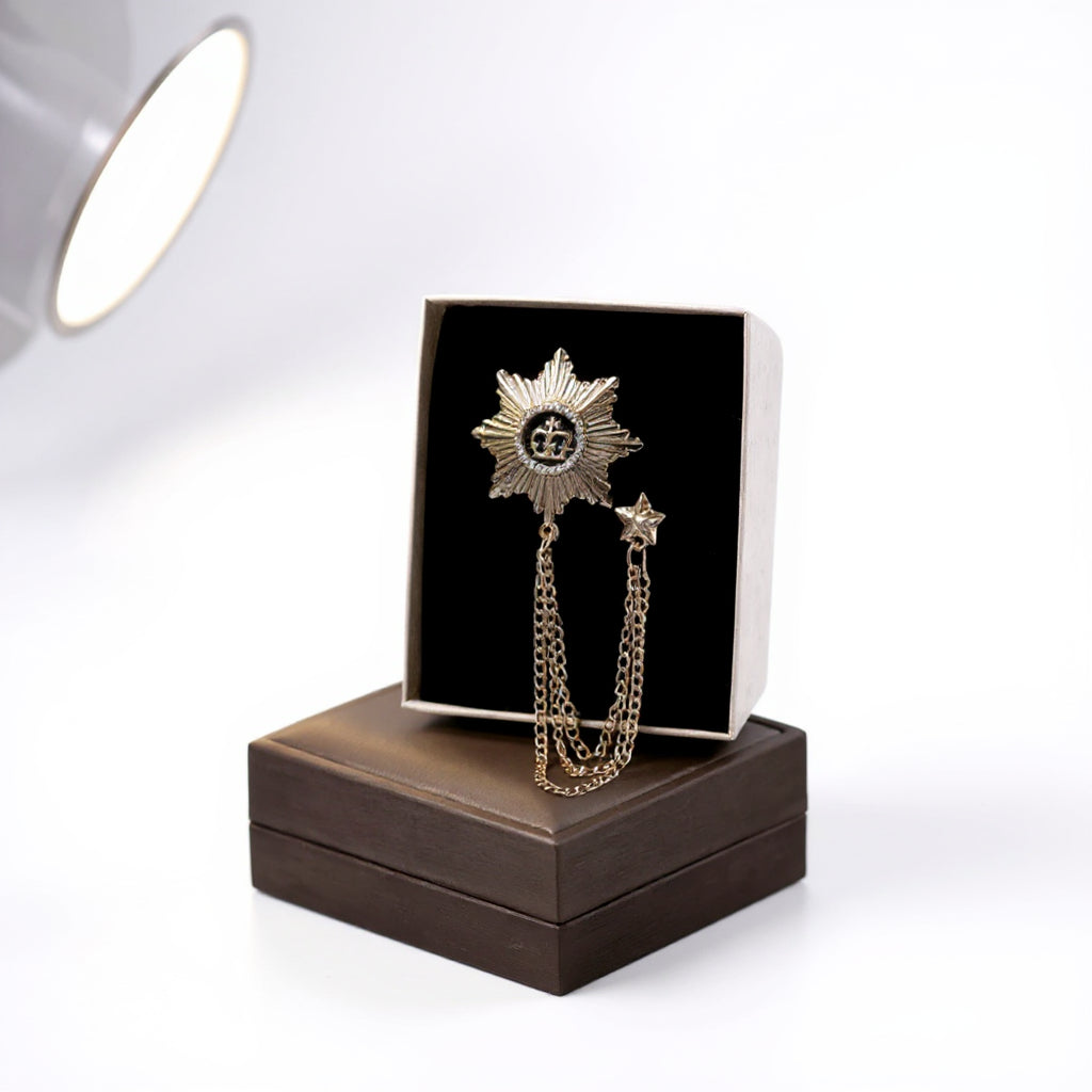 Elegant Gold starburst Chain Brooch Unisex
